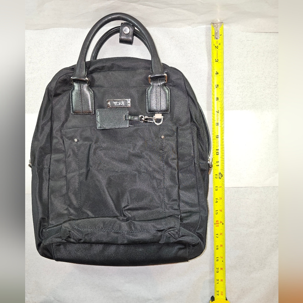 tumi black nylon leather voyageur convertible backpack silver hardware